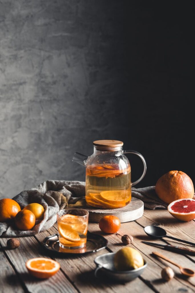 citrus tea in a transparent teapot on a table with 2022 02 02 03 58 56 utc 1