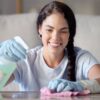 cleaning nanny and woman spray a table surface to 2025 04 06 09 22 56 utc 1